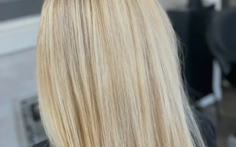 Sleek, glassy smooth blonde after a smoothing treatment by Erica Wilson